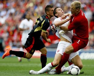 Cahill collided with Joe Hart after a push from Dries Mertens